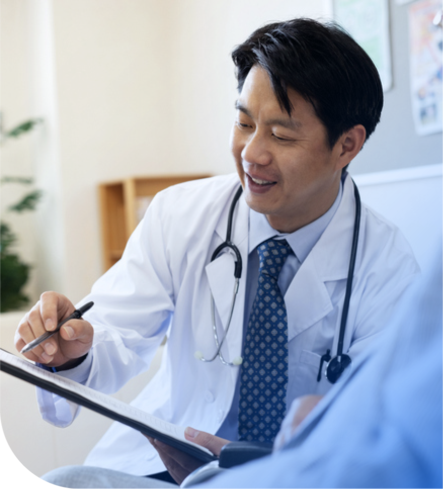 A nerve repair surgeon writes a note on a clipboard